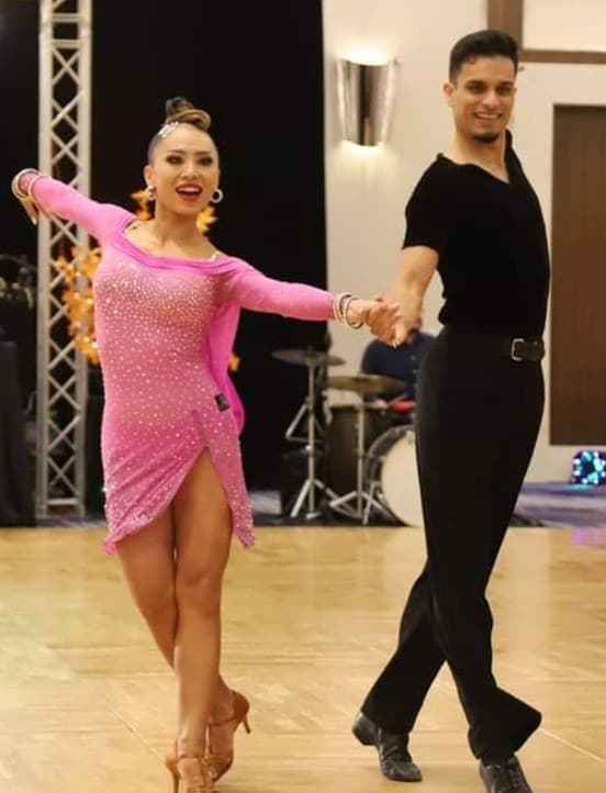 Professional dancers performing a Latin routine at CDC Studios in Mesa, Arizona
